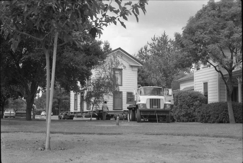 Zanker House in the moving truck as it makes its way into History Park, 1986