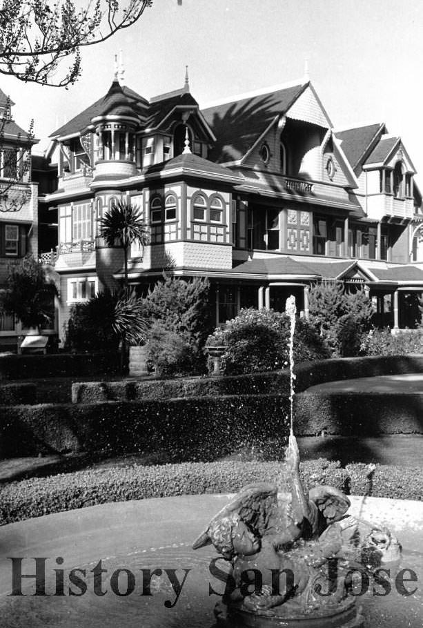 Winchester Mystery House exterior with fountain, 1989
