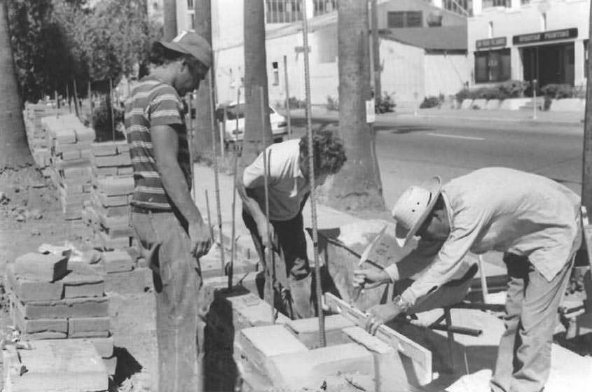 Erecting the wall around Pellier Park, 1976