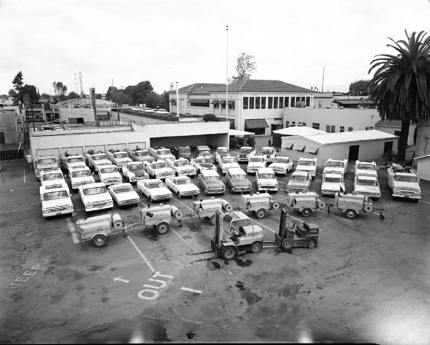 Trucks parked in the yard of the San Jose Water Company, 1962