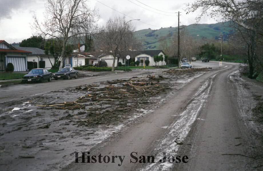 Flood debris on residential street. Possibly the 1998 El Nino Flood in California.