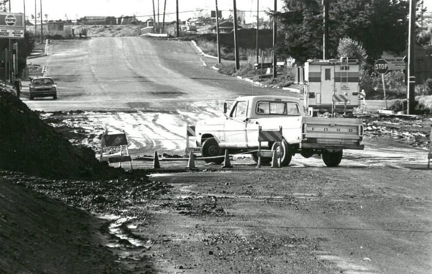 Crossing muddy Gold Street after rain, Alviso, California, 1983