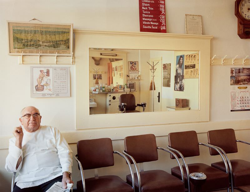 Giannini in his barbershop, established 1936, 484 6th Street, 1980