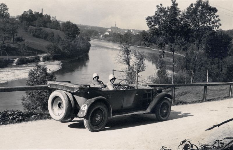 Two stylish ladies posing in an Austrian-registered Steyr XII on the bank of the Isar River near the town of Freising in Bavaria, September 1929