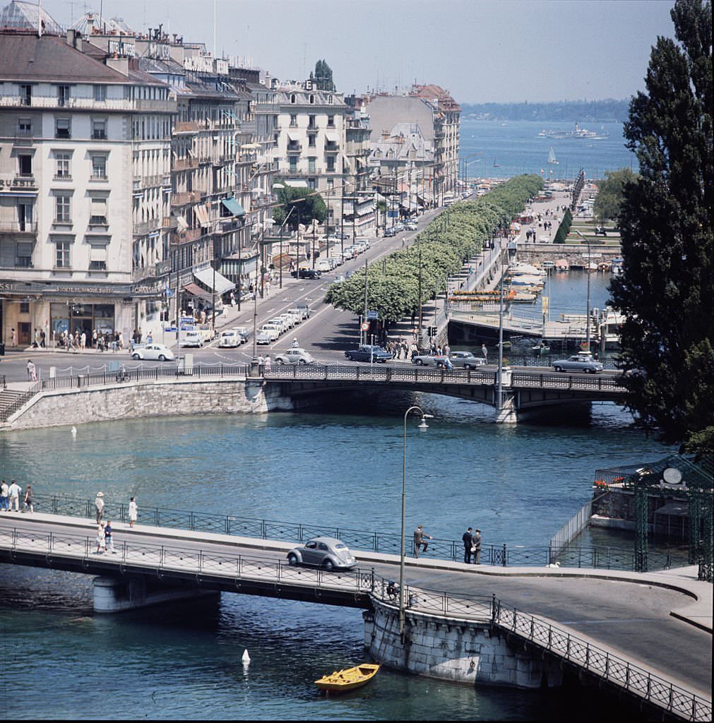 The city of Geneva, Switzerland on the banks of the River Rhone.