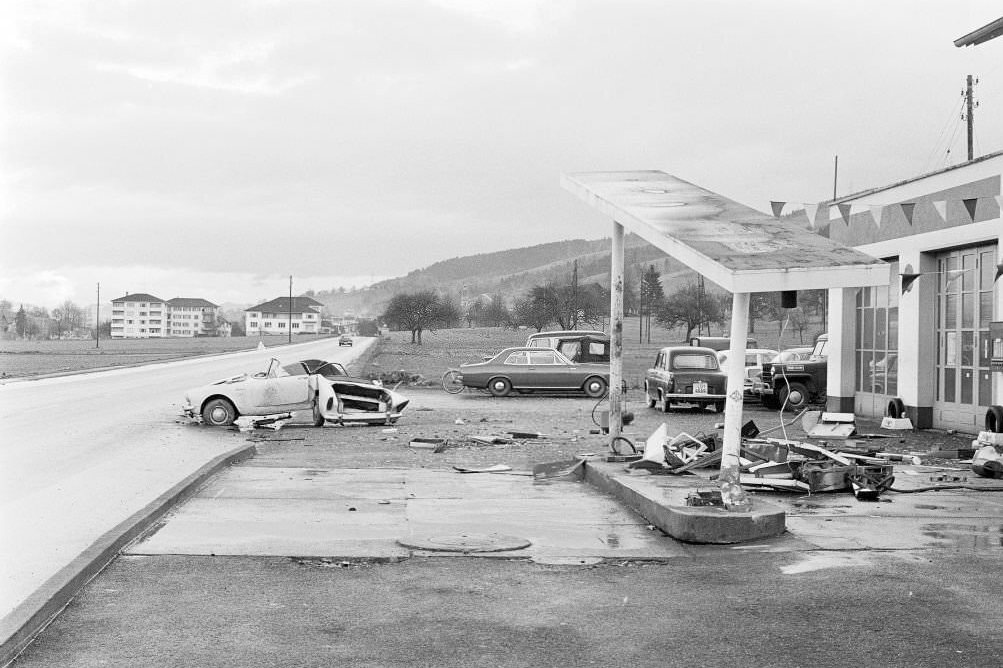 Car drives into gas station and destroys gas pumps, 1970