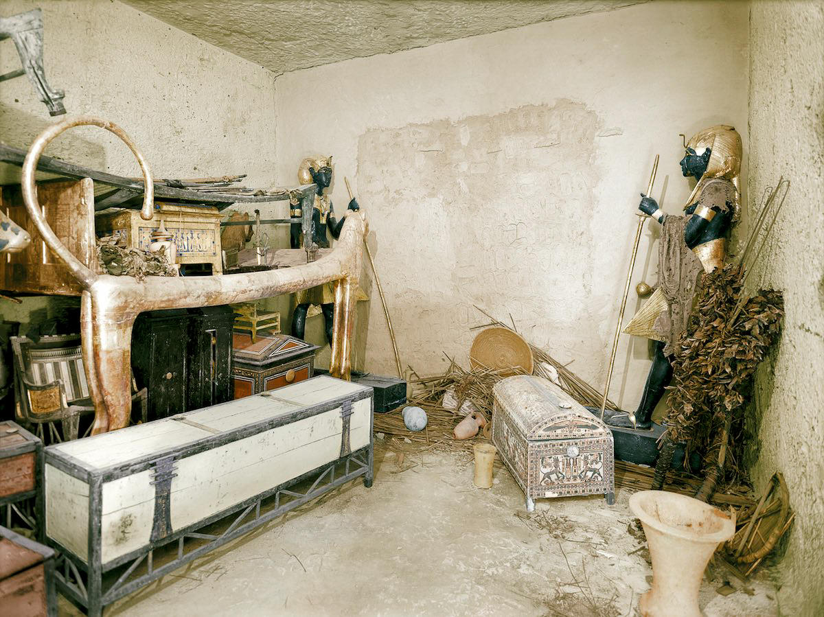 View of the northern wall of the Antechamber showing the sentinel statues (Carter nos. 22 & 29) guarding the sealed doorway leading to the King's Burial Chamber. Tutankhamun's Tomb, December 1925
