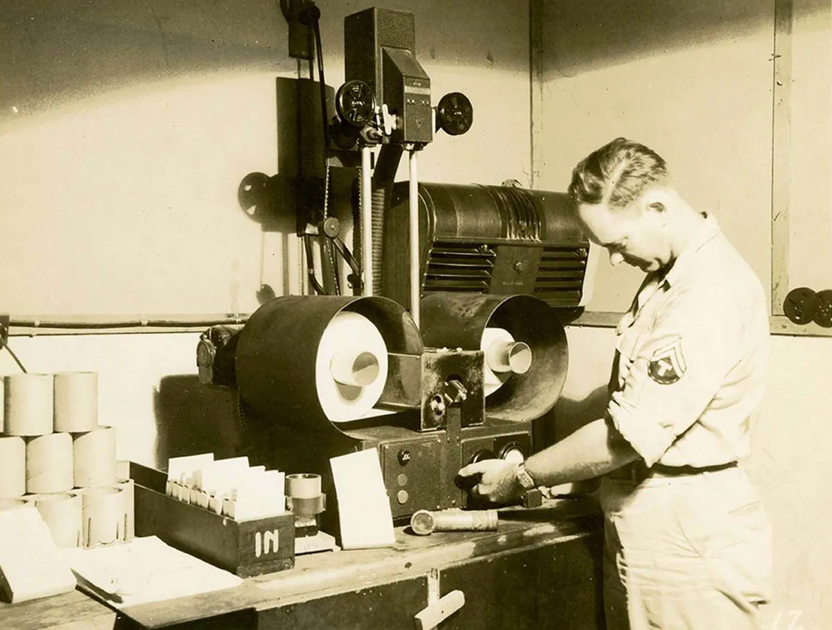 View of the continuous enlarger on which the image on the film is enlarged to regular V-Mail size of 4 1/4 x 5 inches.