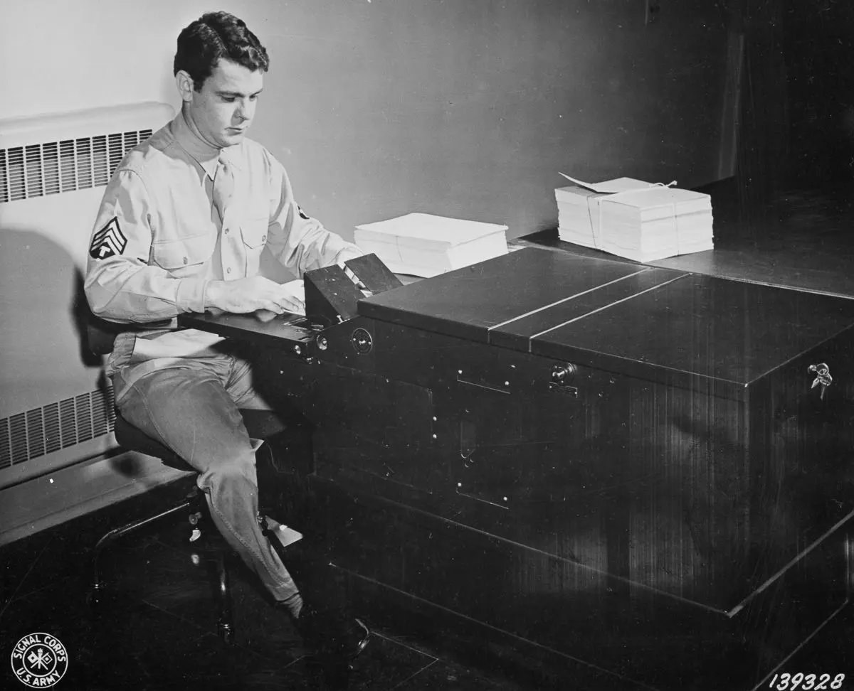 Letters to members of the armed forces overseas are photographed and transferred to V-mail microfilm.