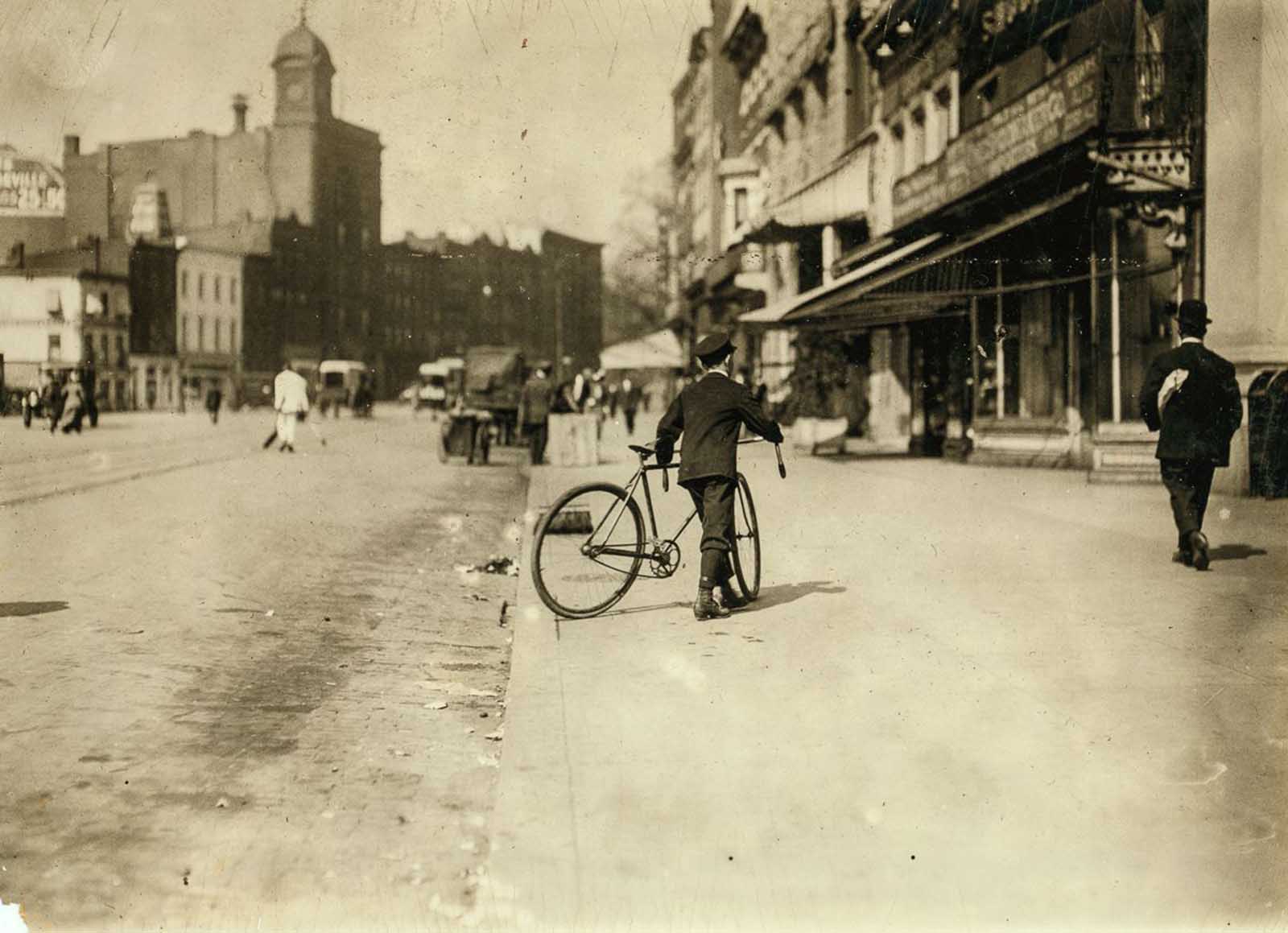 Young messenger making an office call. Location: Washington. D.C.”. April, 1912.