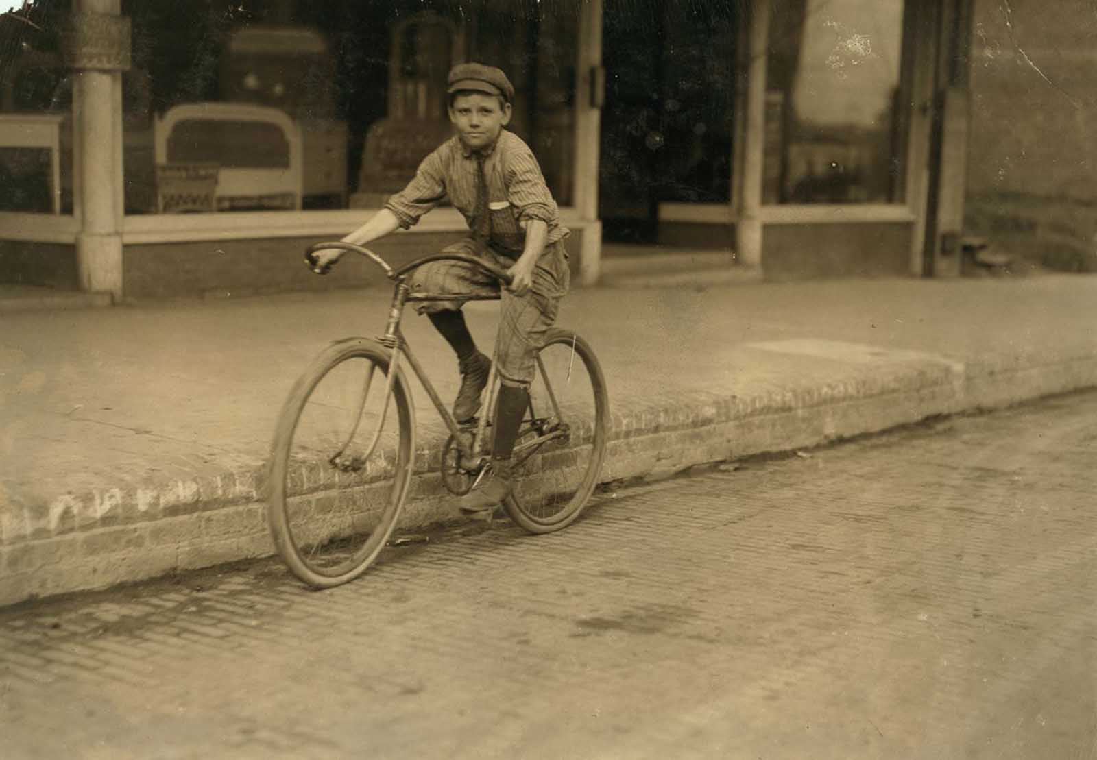 Percy Neville, eleven year old messenger boy. Messenger boy #6 for Mackay Telegraph Company.