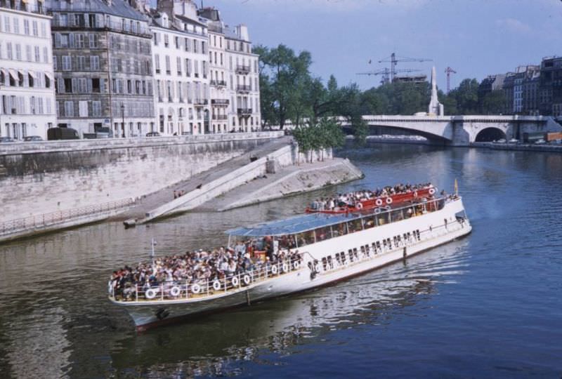 Sightseeing barge above Ile de la Cite, 1960