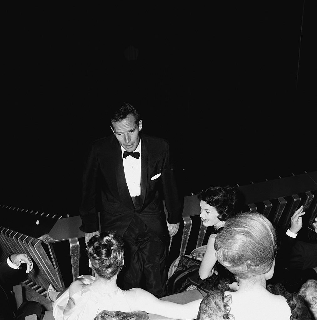 Charlton Heston with his wife Lydia attend the premiere of the movie '55 Days At Peking' 1963