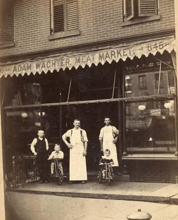 Men and boys outside Adam Wachter's Meat Market, 1880s