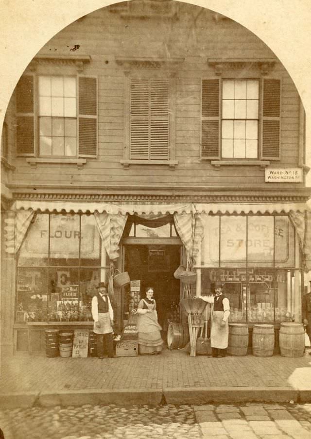 People outside grocery store, Washington St., Boston, MA, 1880s