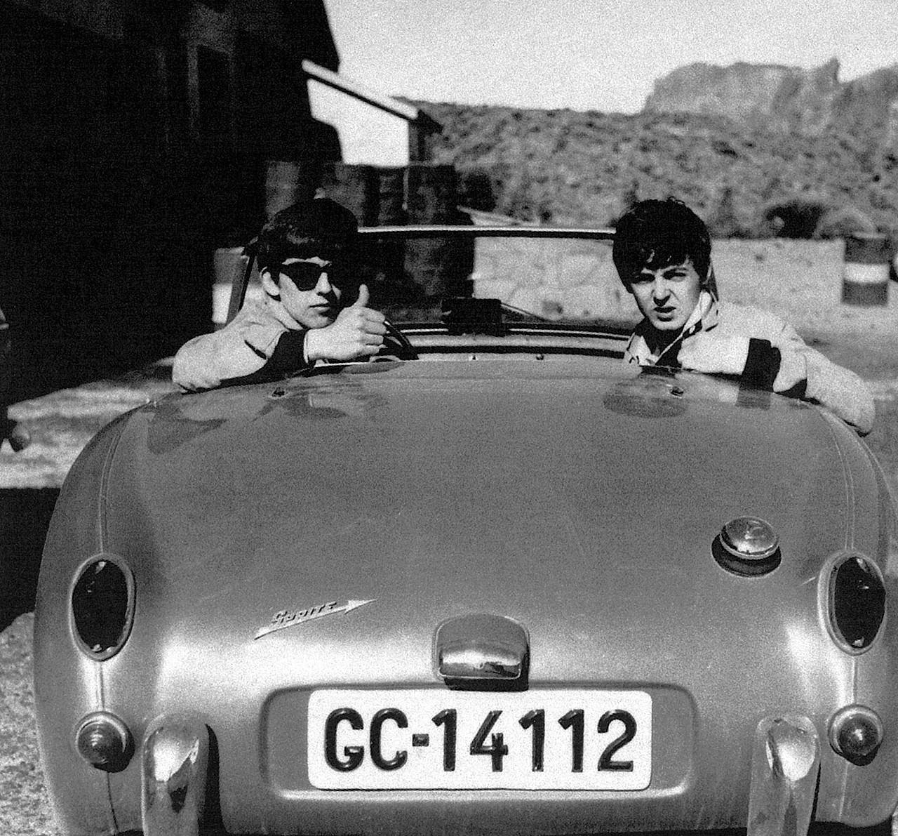 George Harrison and Paul McCartney in pal's Austin Healey Sprite