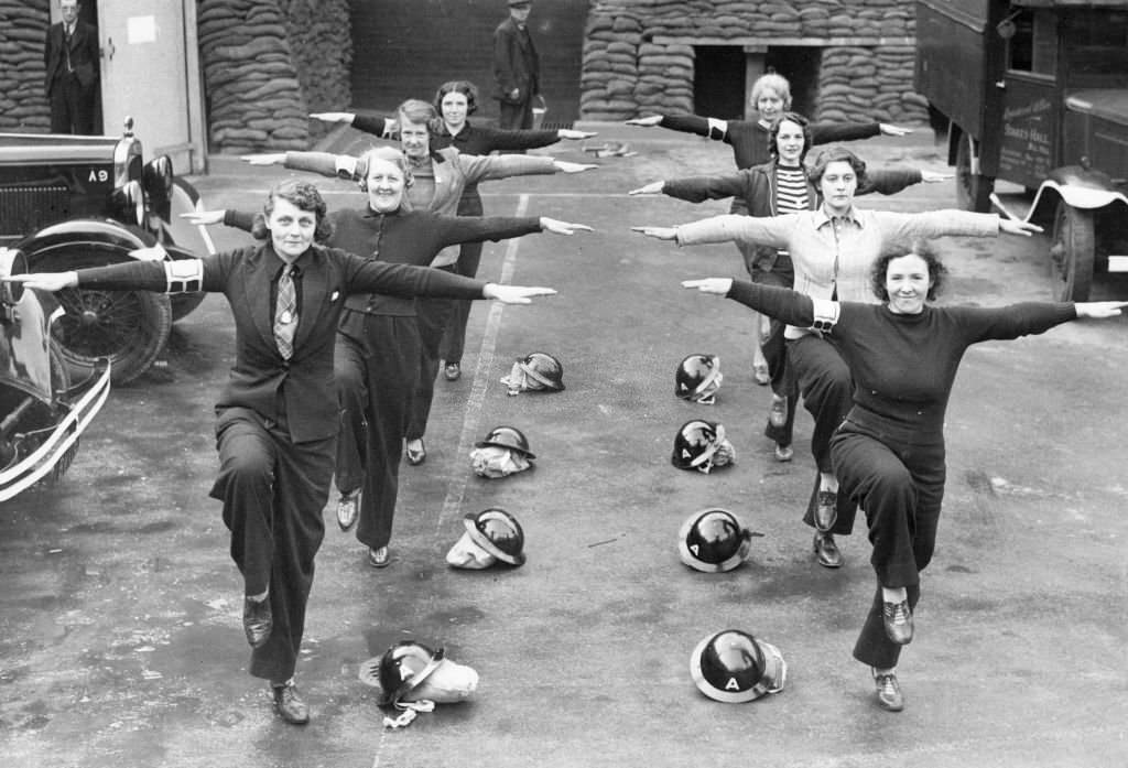 Women ambulance drivers at Blackburn doing their daily physical training exercises, 1931