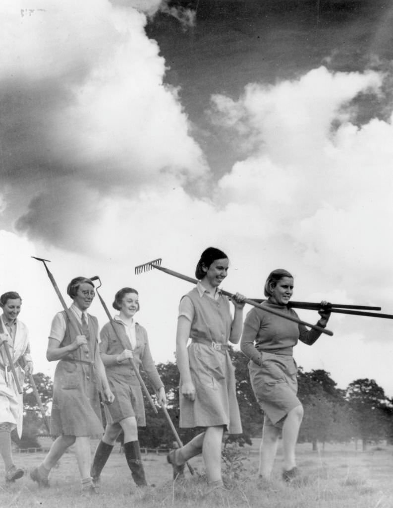 Young members of the Women's Land Army set out for a day's work on a farm in Cheshire, 1939