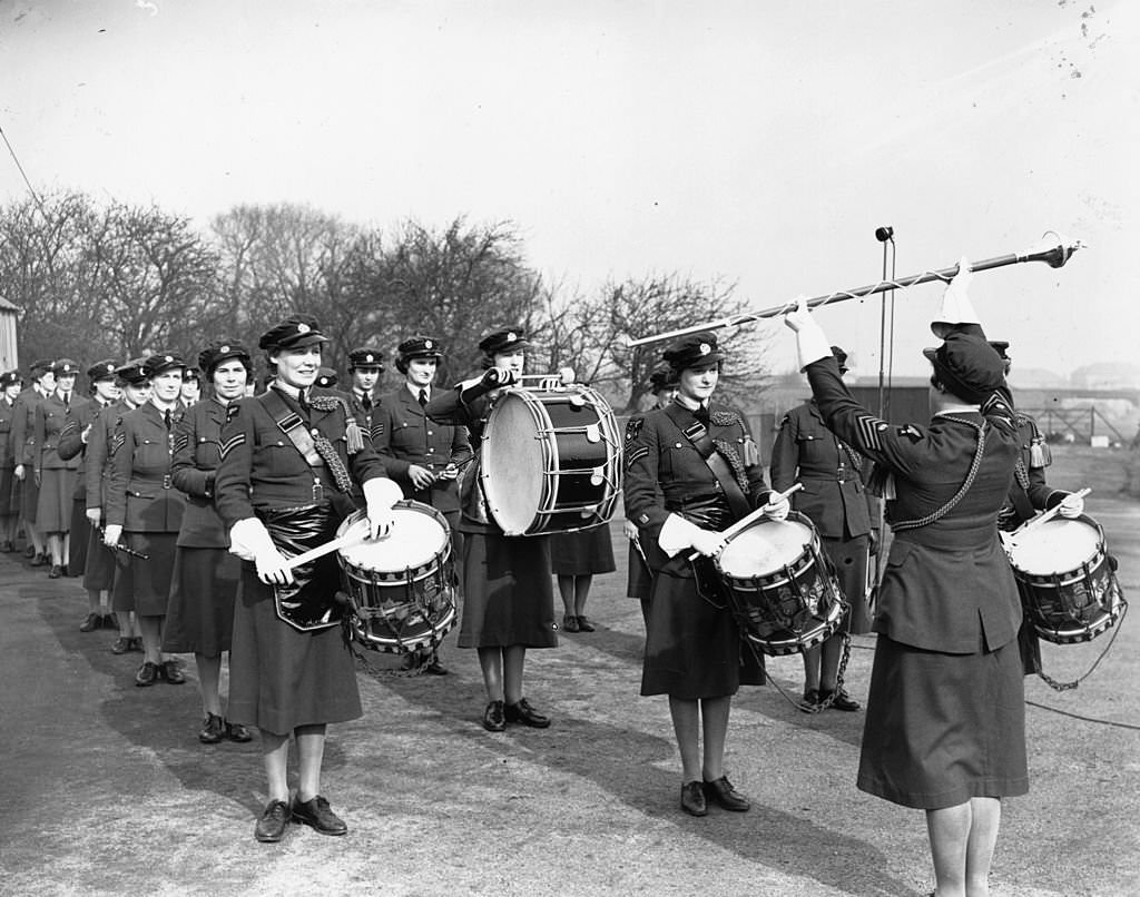 A Women's Auxiliary Air Force band with Drum Major, Senior Sergeant Manley, 1939