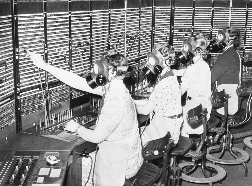 British "Hello-girls" ready to "carry on" In case of an air-raid, England will expect every telephone operator to do her duty, 1939