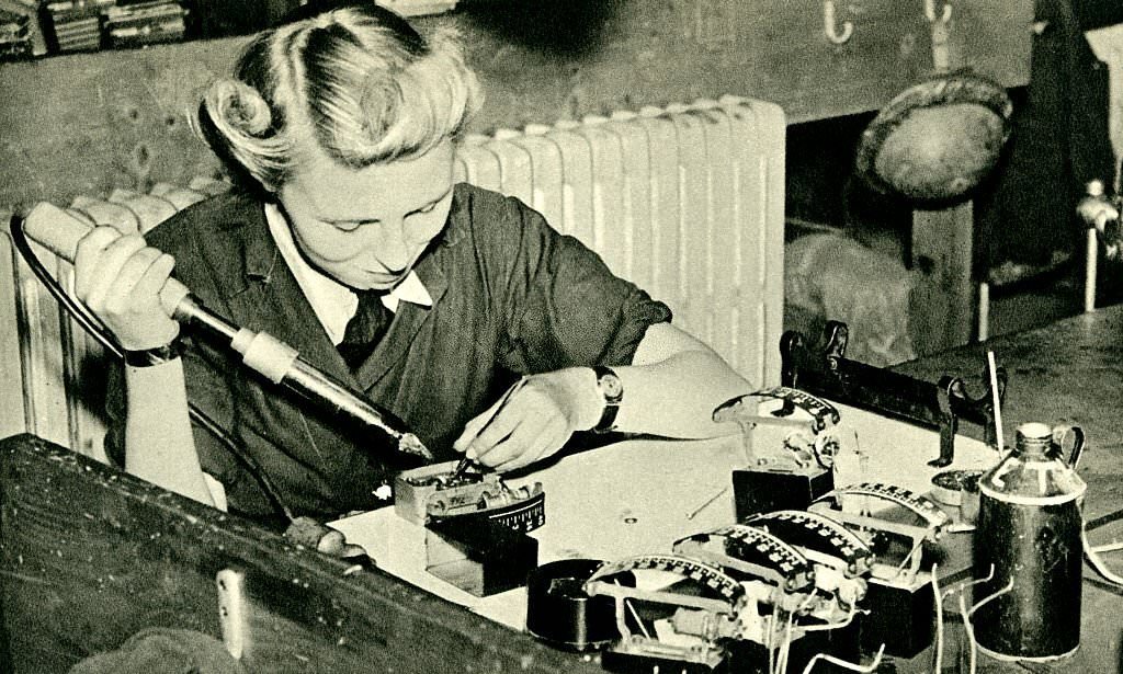 British Womens Auxiliary Air Force. Woman repairing electical engine speed indicators. Female auxiliary division of Royal Air Force. British postcard series, No. 11.
