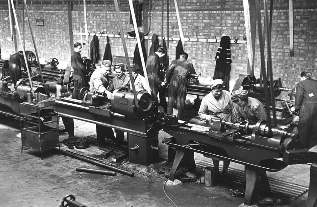 British women being trained at a munitions factory during World War II.