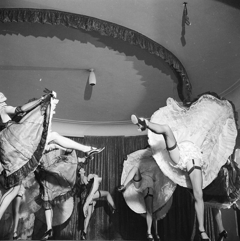 A cabaret dancer performs at London's Pigalle nightclub in Piccadilly, 1955.