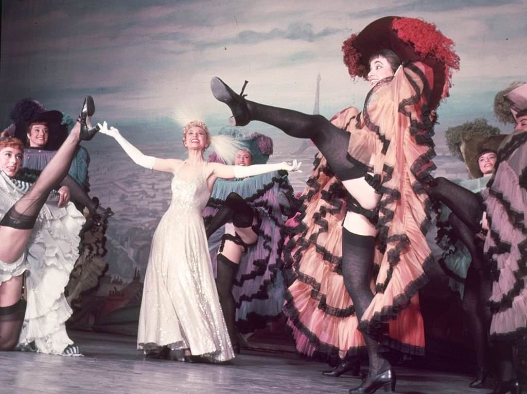 Can-Can dancers performing in a Cole Porter show at the Coliseum in London, 1954.