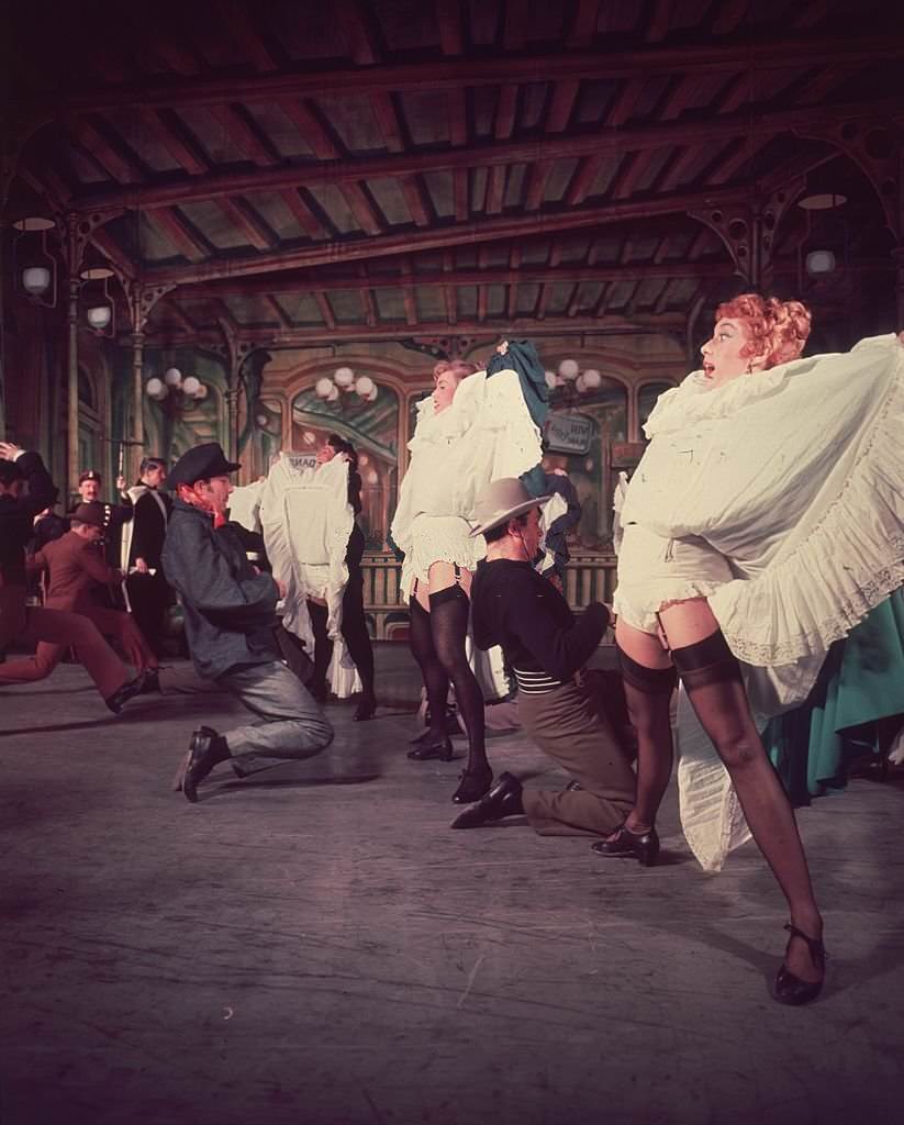 Can-Can dancers performing in a Cole Porter show at the Coliseum in London, 1954.