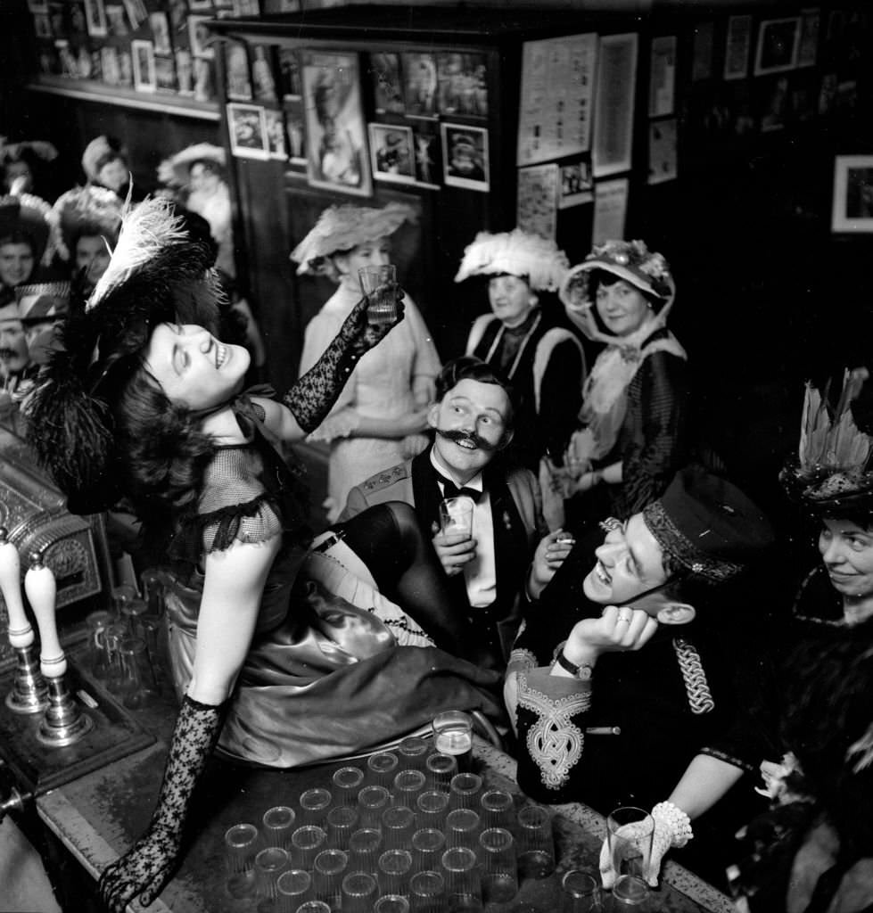 Can-Can dancers cavorting on the bar at the City Varieties Music hall at Leeds, 1953.