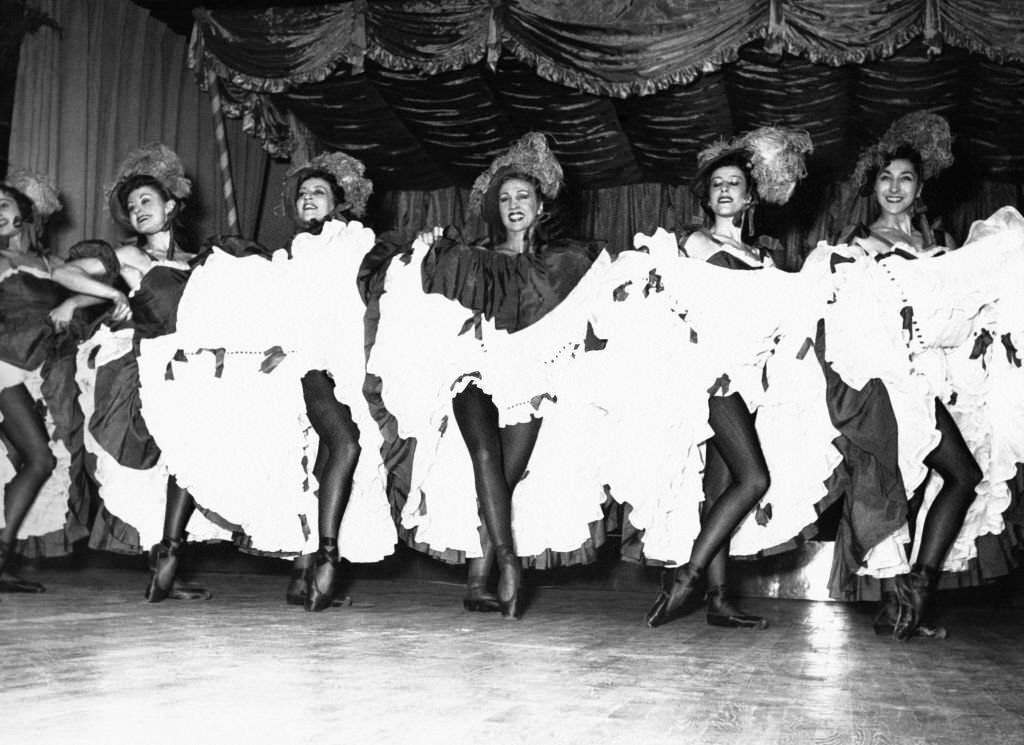 Star dancers from the Paris Opera dance the French Cancan at the Moulin Rouge, 1953