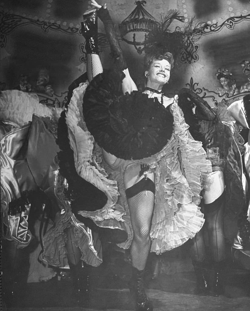 Girls performing the Can Can during the New Opera Company's Broadway production of Merry Widow.