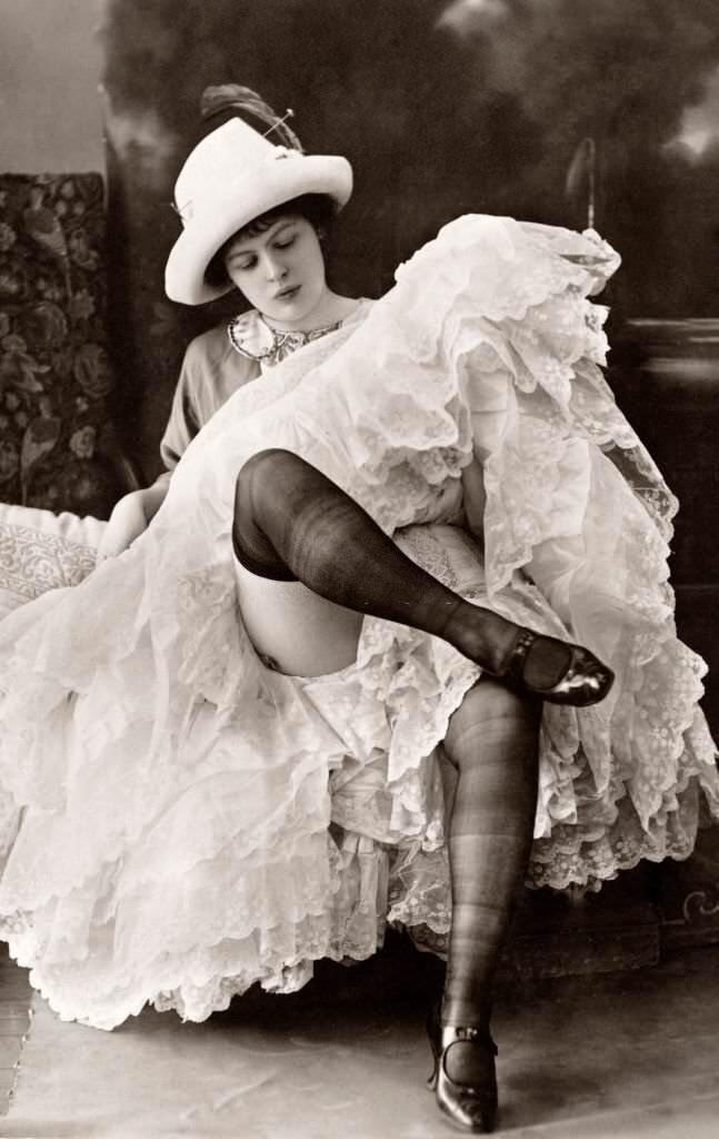 A can-can dancer in repose at the Bal Tabarin, a cabaret night club in Paris, 1915.