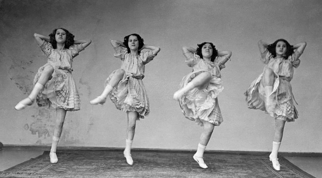 The Dancing English Teenager' on stage, four girls at a can-can number, date unknown, probably around 1910