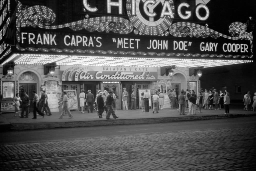 Crowd and Movie Theater Marquee at Night, Chicago, July 1941