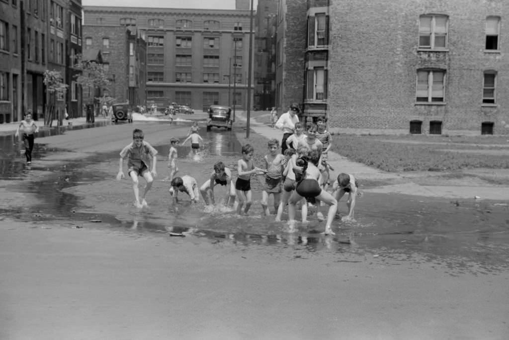 Children Cooling off in Water from Fire Hydrant, Chicago, Illinois, July 1941