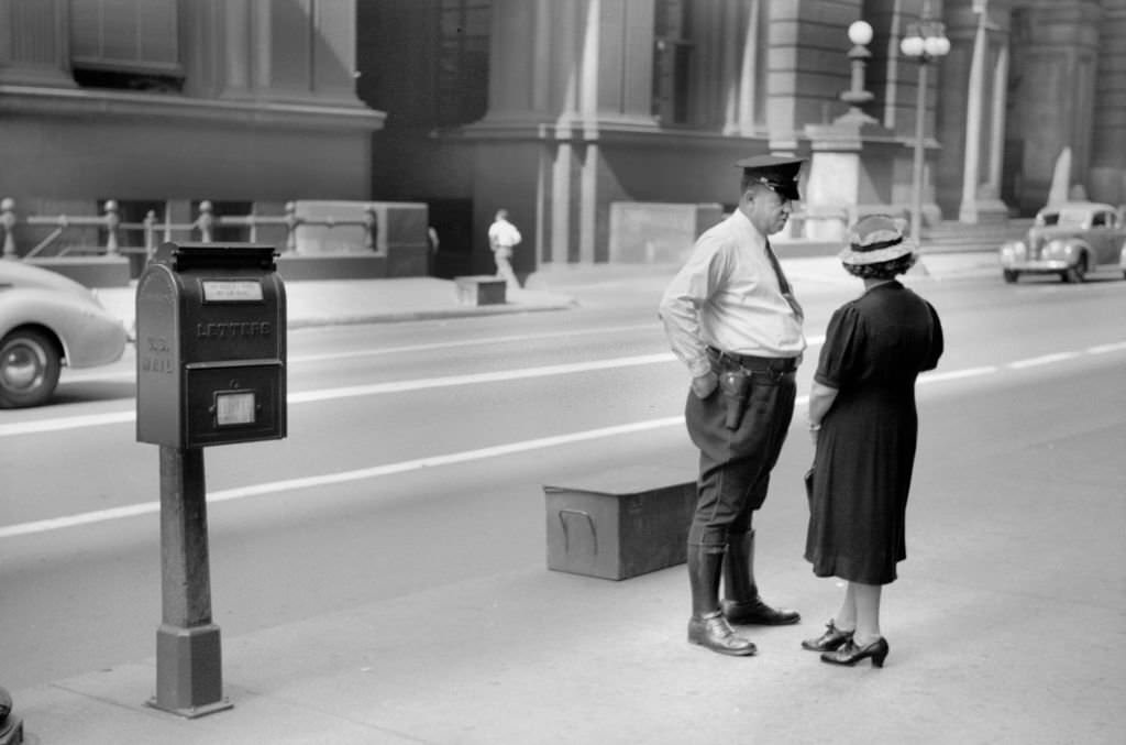 Woman Talking to Policeman, Chicago, Illinois, July 1941