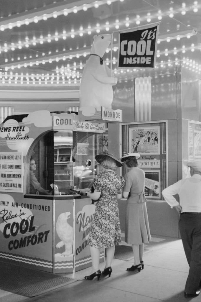 Two Women Buying Tickets at Movie Theater, Chicago, Illinois, July 1941