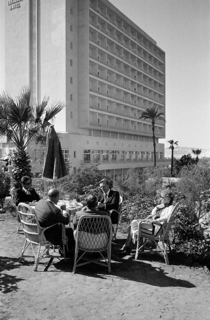 Baron Edouard-Jean Empain, in the center, with his mother on the right, Aswan, 1979