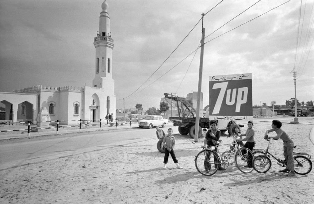 Children in a street in El-Arich in North Sinai with a mosque in the background, 1978