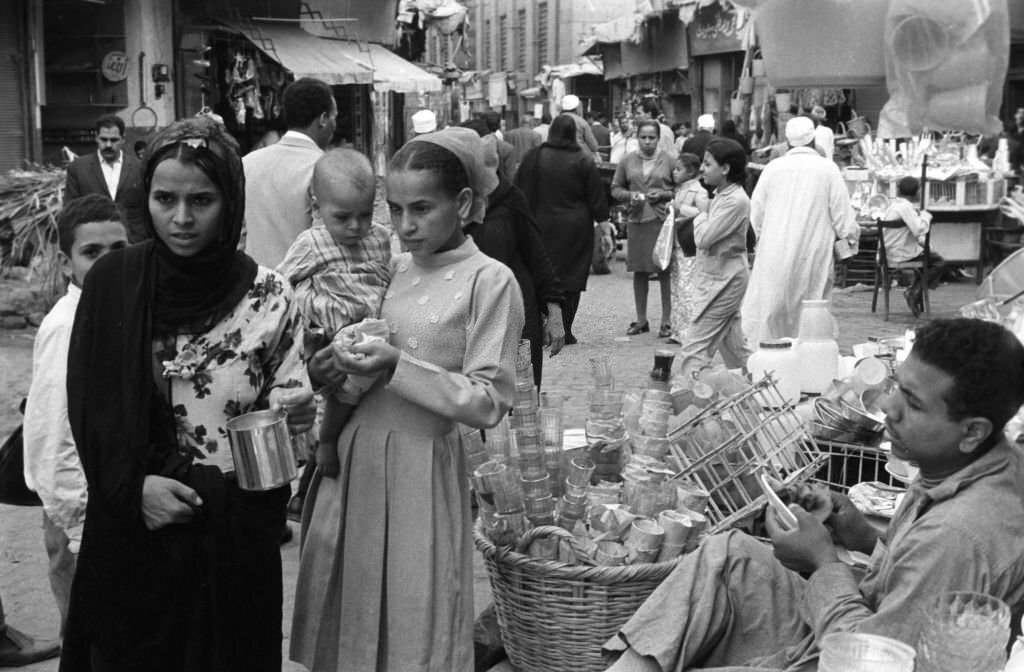 Two young women without veils shopping in a bazaar in Cairo, 1972