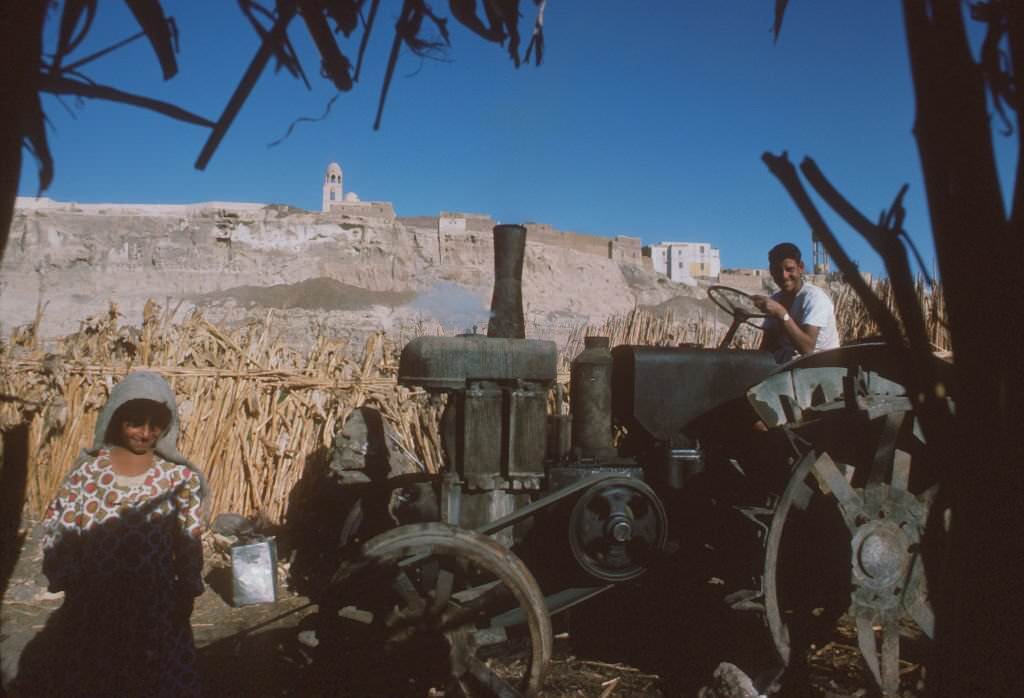 A man on his tractor, 1970s