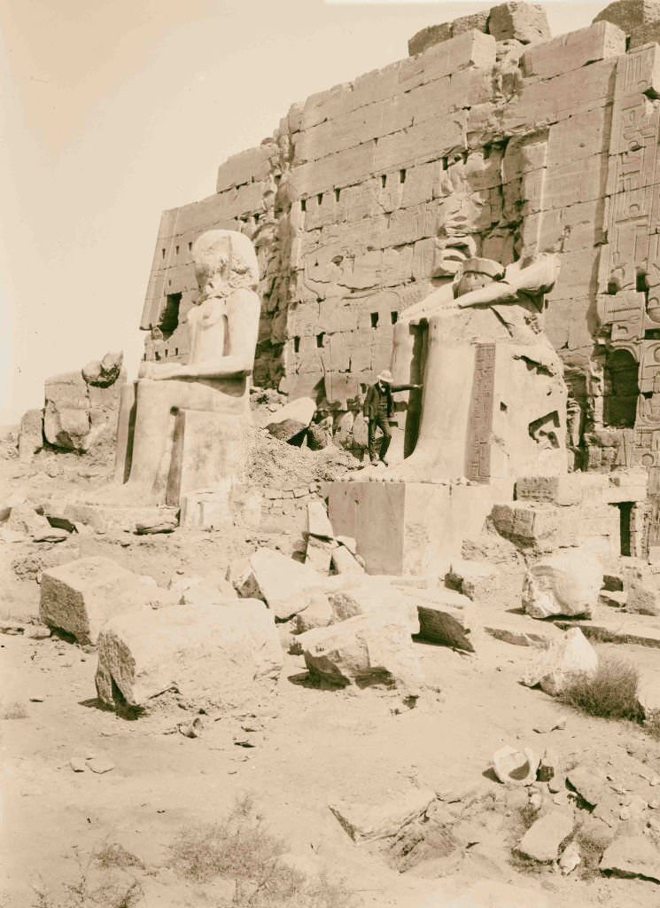 Statues of kings behind 8th pylon, Karnak, Egypt, 1900.