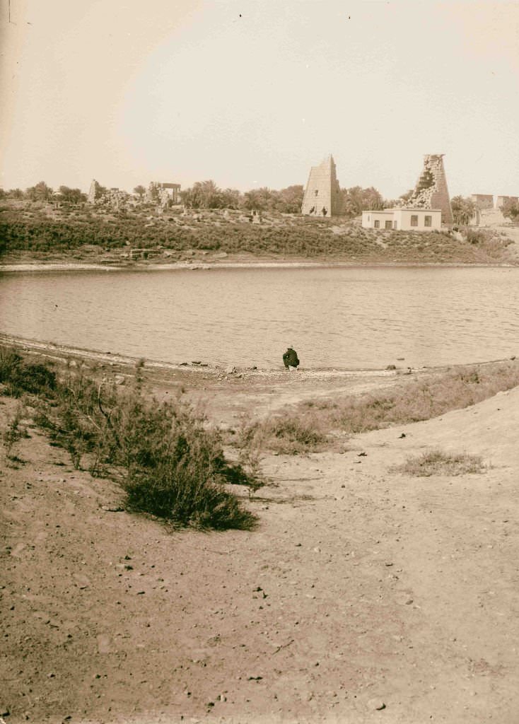 The sacred lake, Karnak, Egypt, 1900.