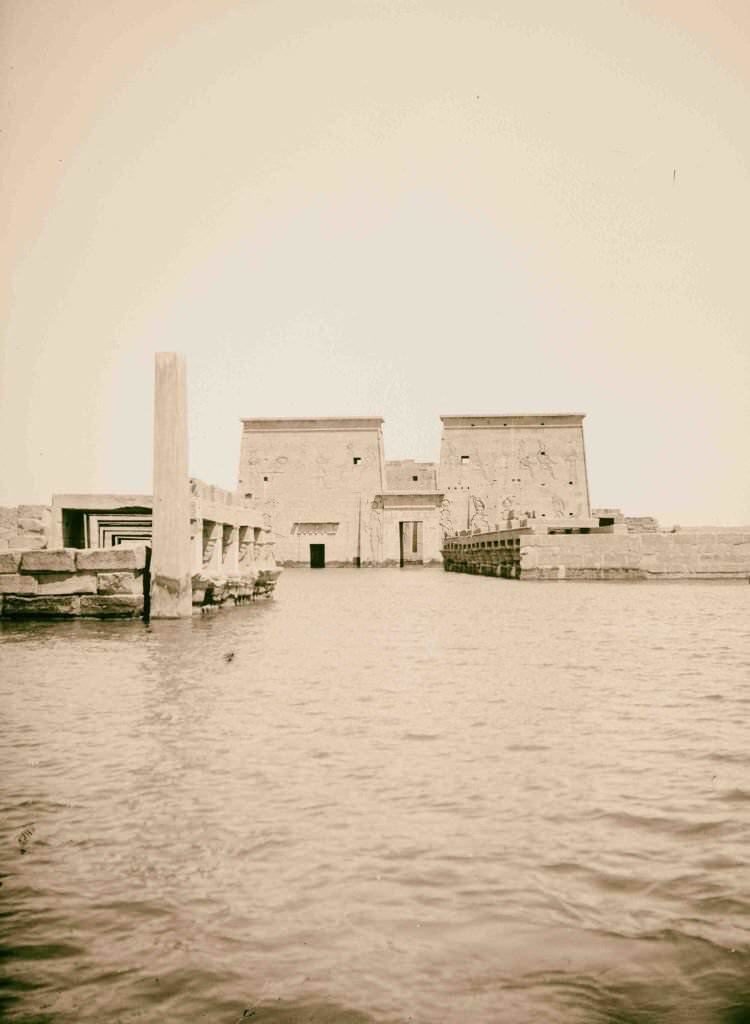 Temple of Isis, showing obelisk and colonnade, Egypt, 1900.