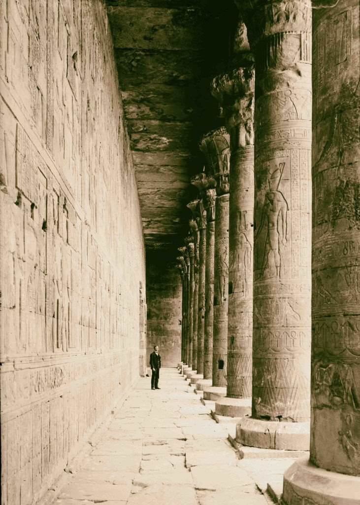 Temple of Horus, Edfu. Colonnade in court showing carving on pillars, 1900.