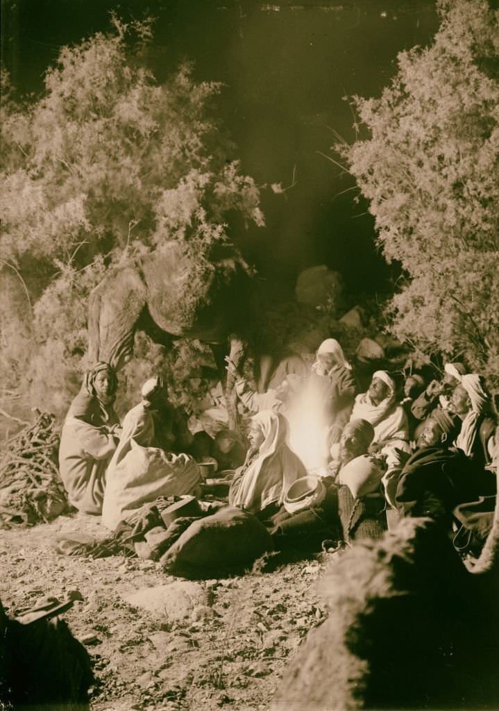 Typical scene around the campfire at night in Sinai, 1900.
