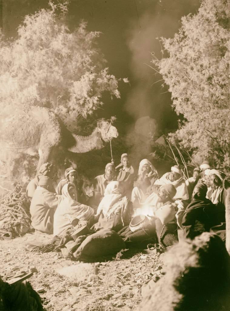 Typical scene around the campfire at night in Sinai, Egypt, 1900.