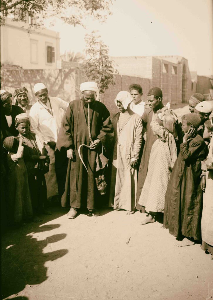 Snake charmer in Cairo, 1900