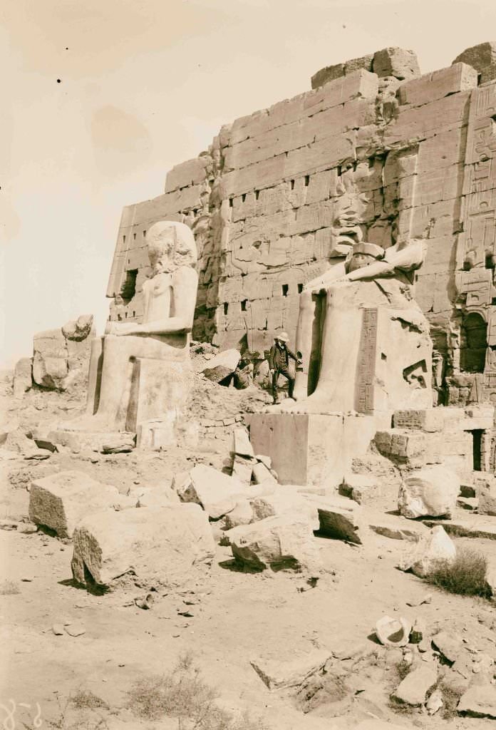 Statues of kings behind 8th pylon, Egypt, 1900.
